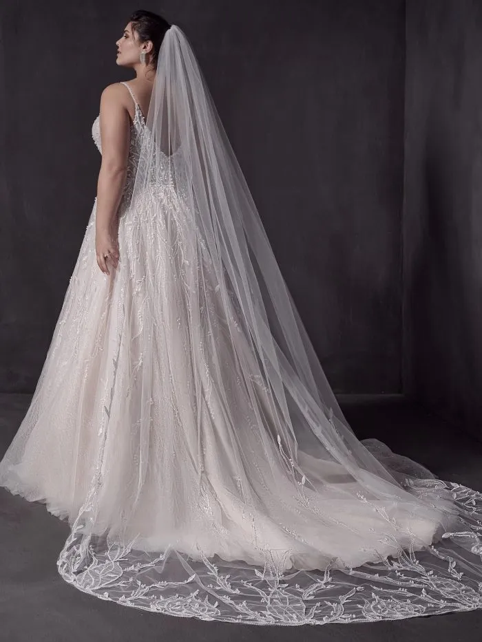 Bride Wearing Beaded A-Line Wedding Dress Called Marvine By Sottero And Midgley